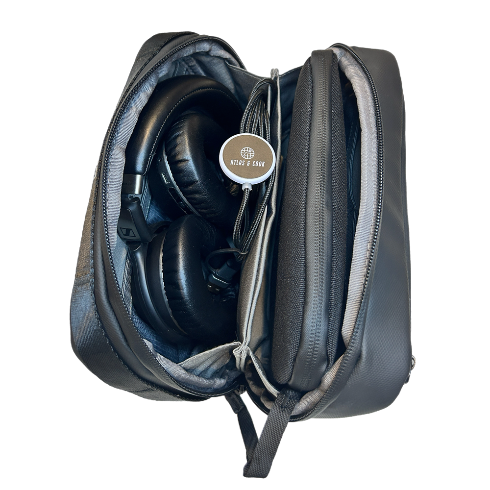 Open travel tech pouch showing organised compartments