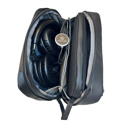Open travel tech pouch showing organised compartments